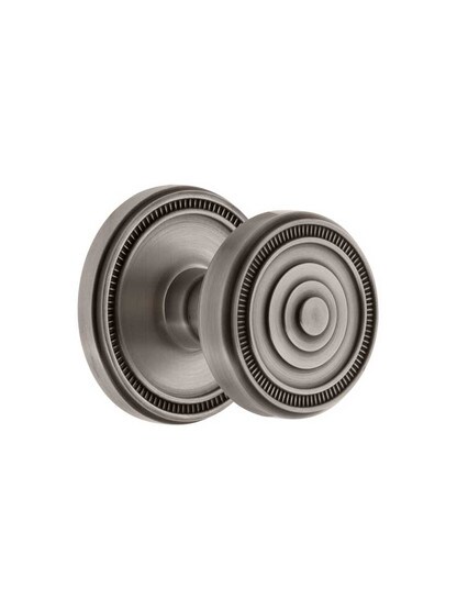 Grandeur Soleil Rosette Door Set with Soleil Knobs in Antique Pewter.